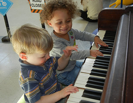 Boy and Girl at Piano
