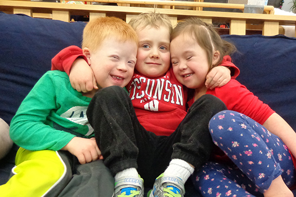 Inclusion photo - three children together