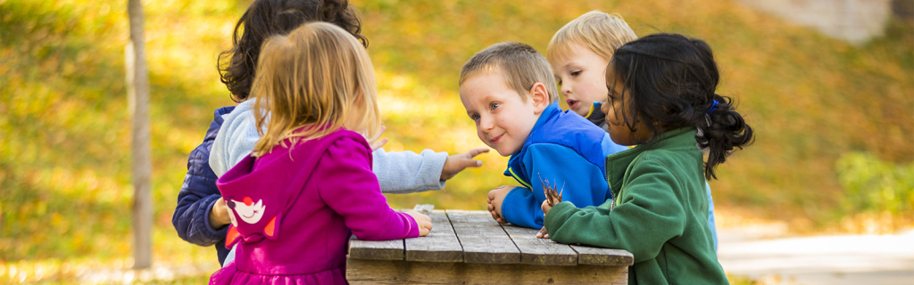 WECP Hero image - children at picnic table
